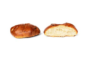 Bun with raisins isolated on white background.