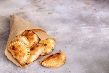 .Fresh baked Empanadillas, small filling  pies. Popular snack Latin American cultures  and Spain. .
