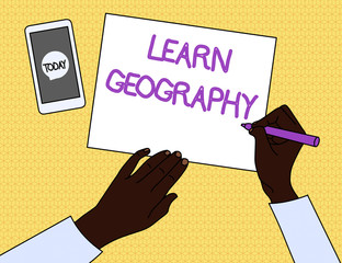 Handwriting text Learn Geography. Concept meaning study of physical features of earth and its atmosphere Top View Man Writing Blank Paper Pen Pencil Marker Smartphone Message Icon.