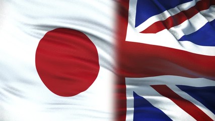 Great Britain and Japan politicians exchanging top secret envelope against flags