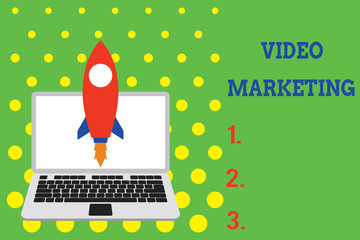 Handwriting text Video Marketing. Conceptual photo create short videos about specific topics using articles Launching rocket up laptop . Startup project. Developing goal objectives