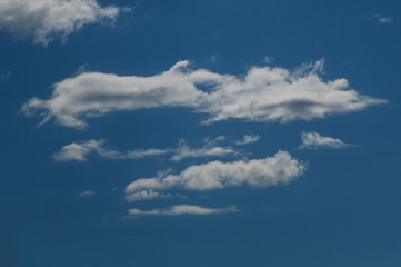 fluffy clouds on a sunny sky