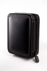 Naklejka premium Black wallet isolated on white background