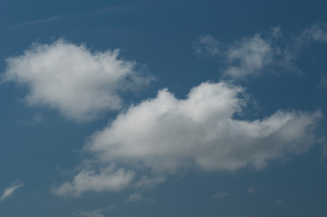 Fototapeta premium fluffy clouds on a sunny day