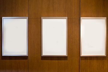Blank paper frame on the wall