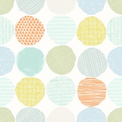 Abstract seamless pattern of circles with hand drawn texture in pastel colors. Tender vector illustration in vintage style on beige background.