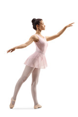 Young graceful ballerina dancing