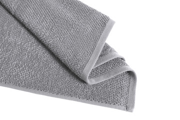 Grey folded terry towel isolated