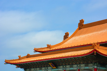 Fototapeta na wymiar The roof details texture of National Theater and National Concert Hall of Taiwan in Chiang Kai-Shek Memorial Hall area isolated on blue sky background, clipping path