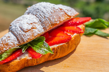 Sweet croissant with Strawberry and mint, Fresh morning breakfast