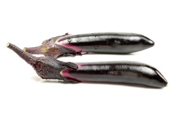 eggplant or aubergine and parsley leaf on white background