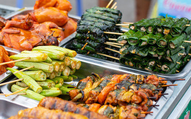 Street market with Vietnamese food cousine. Exotic asian food. Seafood and vegetables.