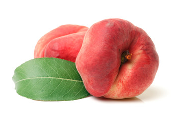 chinese flat peaches on white background 