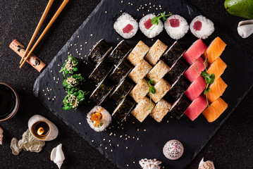 sushi on the black backround