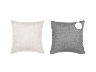 Gray and beige pillows on the white background.