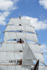 Fototapeta premium A mast and sail of the sailing boat of the day when it was fine