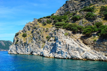 Fototapeta na wymiar amazing clear waters of the Aegean Sea and the rocks