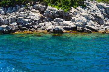 amazing clear waters of the Aegean Sea and the rocks