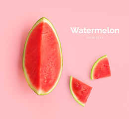 Creative layout made of watermelon. Flat lay. Food concept. Watermelon on pink background.