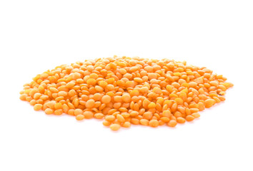 Raw lentils on white background