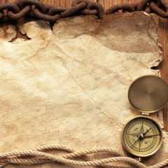 Compass, rope, paper and chain