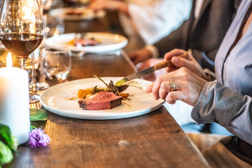 Eating Steak at rustic table
