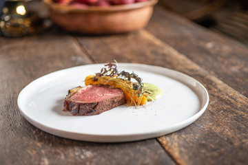 Beautiful plate of ribeye steak in country kitchen
