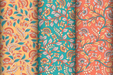 Three seamless square patterns in three color options. Intertwining branches of flowers. Indian style. 