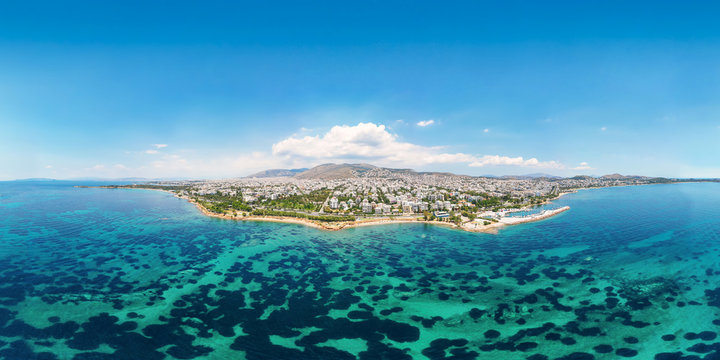 Wide aerial, panoramic view of the south coast of Athens, the Riviera with emerald sea, beaches and marinas