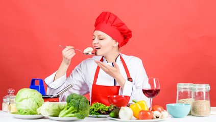 Cooking food and housekeeping. Housewife routine. Professional cooking tips. Woman chef try taste eat food. Delicious recipe concept. Cooking meal. Cooking healthy food. Girl at kitchen table