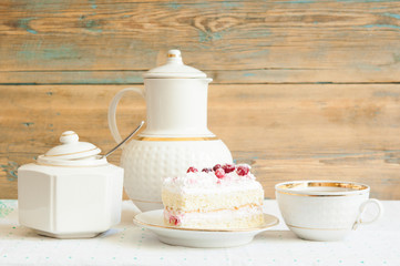 slice cake with white chocolate and cranberry on a plate