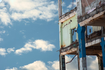 Facade of abandoned and destroyed building