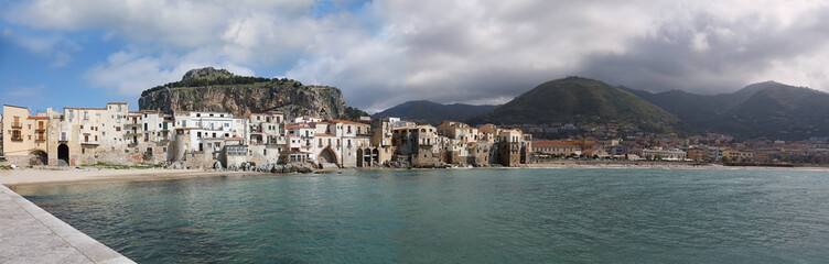 Fototapeta na wymiar Panorama of the seaside of Cefalu town, Italy