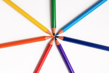 Naklejka premium color pencils close up on white background rainbow color