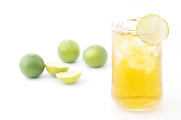 tea with lemon in glass isolated on white background