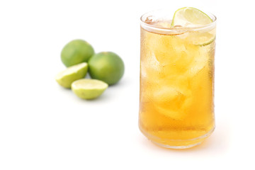 tea with lemon in glass isolated on white background