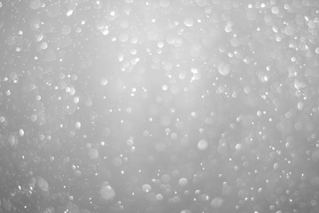 Bokeh background and bubbles reflecting black and white light