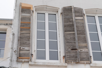 old shutters in restoration waiting for new paint