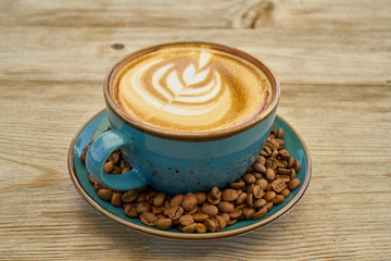 Latte coffee and coffee beans