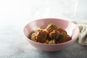 Homemade meatballs with herbs and couscous