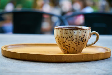 Delicious Turkish coffee on wooden dish