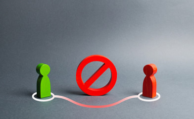 Two human figures form a link around the red NO sign. Bypassing prohibitions and barriers, doing...