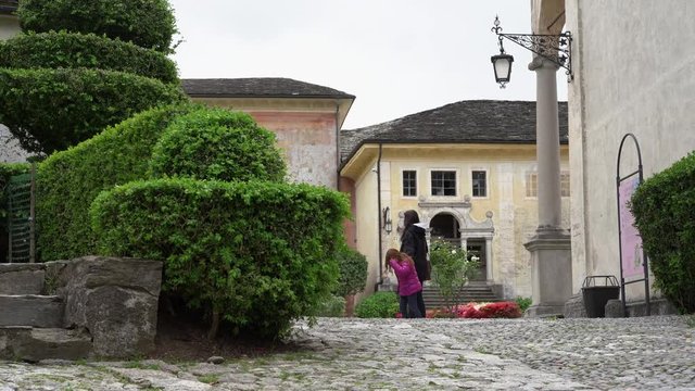 A beautiful travel tour at the Sacred Mountain of Varallo, a christian devotional complex, a unesco world heritage si in Italy. Zoom out 4k footage