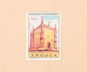 ANGOLA - CIRCA 1968: A stamp printed in Angola shows a large church, circa 1968