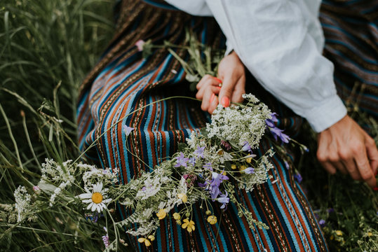 Folk Girl In The Midsummer Making Flower