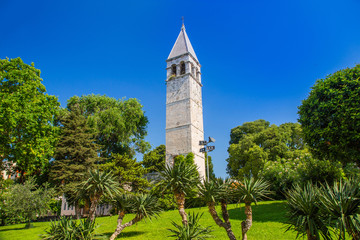 Split, Croatia, bell Tower of St. Arnir and benedictine monastery in beautiful classic park
