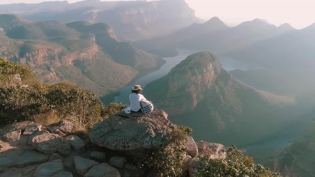 Young Travel Woman Sits Overlooking Blyde River Canyon