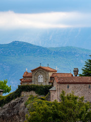 Fototapeta na wymiar The St. Stephen's Monastery and beautiful landscapes of Meteora and blue sky, Kalambaka, Greece