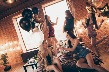 Fototapeta na wymiar Close up photo beautiful birthday event five she her fancy chic ladies rejoice bed sheets gathering decorated balloons room unexpected wedding congrats clink wineglasses night evening room indoors
