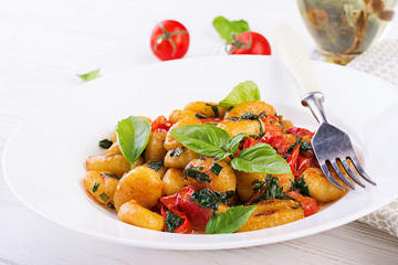 Gnocchi pasta in rustic style.  Italian cuisine. Vegetarian vegetable pasta. Cooking lunch. Gourmet dish.